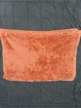 Orange fleece queen throw blanket with a soft and cozy feel